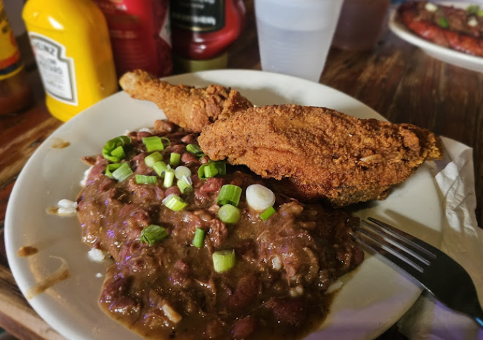 Coop’s Place signature dishes Rabbit & Sausage JambalayaCajun Fried Chicken Seafood Gumbo